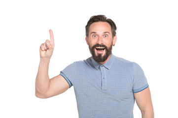 Fototapeta premium Cheerful bearded man keeping his finger up with excitement