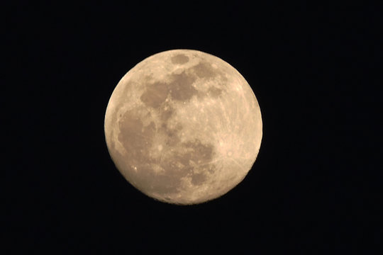 The full phase of the moon in the night sky, full moon close-up photos,