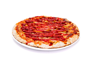 Pizza with ketchup on a white, isolated background. Pizza with chicken and cheese on a white background. The concept of eating pizza, preparing a quick dish for guests.