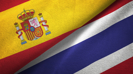 Spain and Thailand two flags textile cloth, fabric texture