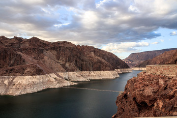 Fototapeta na wymiar Hoover Dam is a concrete arch-gravity dam in the Black Canyon of the Colorado River, on the border between the U.S. states of Nevada and Arizona. It is Hydroelectric power station
