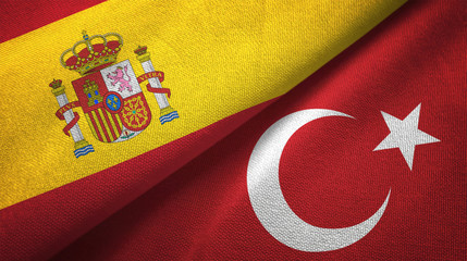 Spain and Turkey two flags textile cloth, fabric texture