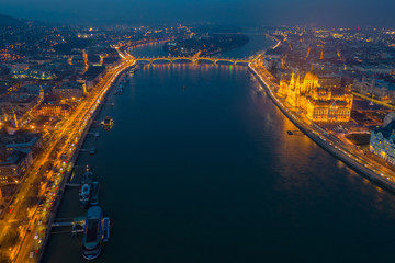 Fototapeta na wymiar Budapest, Hungary - Aerial skyline view of Budapest by night with illuminated Parliament, Margaret Bridge and riverside of River Danube