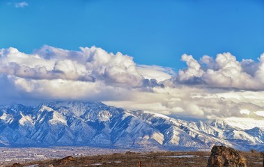 Winter Panoramic view of Snow capped Wasatch Front Rocky Mountains, Great Salt Lake Valley and...