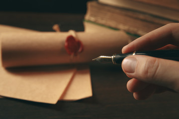 Businessman writing testament at notary public office