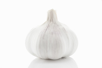 Fresh garlic closeup on a white background. High key.
