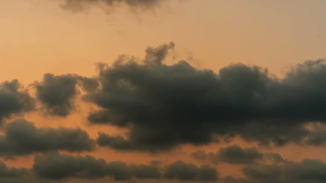Time lapse shot of sky with clouds at sunset