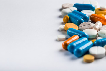 Assorted pharmaceutical medicine pills, tablets and capsules.Pills background.