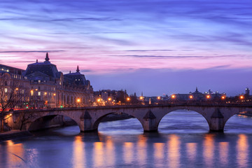 Obraz premium Sunset over the Seine river in Paris, France