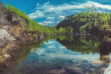 Mountain lake in the rocks in the Khibiny