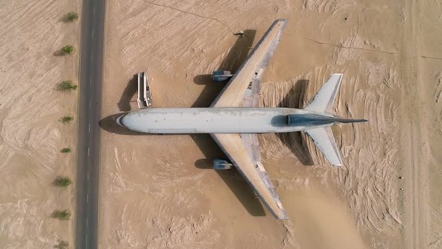 Aerial view above of museum airplane on desert landscape, Abu Dhabi, U.A.E