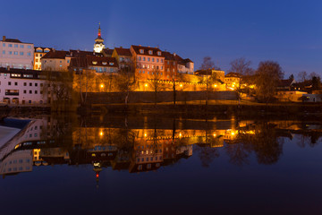 Fototapeta na wymiar Night winter royal medieval Town Pisek with the Castle above the river Otava, Czech Republic 