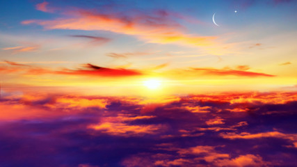 Crescent moon with beautiful sunset background . Generous Ramadan . Light from sky . Religion background . 
