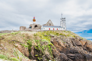 Fototapeta na wymiar Saint-Mathieu lighthouse and former abbey at Pointe Saint-Mathieu