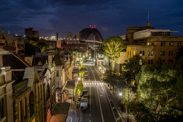 A view down towards the Sydney Harbour Bridge through the historic area called The Rocks