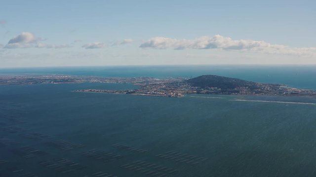 Sète French town Venice of Languedoc port and seaside resort mediterranean aerial view with the bassin the Thau in foreground