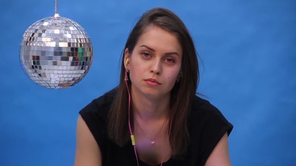 Girl with disco ball on blue background - Powered by Adobe