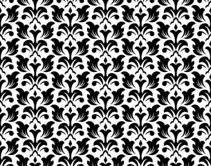 Wallpaper in the style of Baroque. Seamless vector background. White and black floral ornament. Graphic pattern for fabric, wallpaper, packaging. Ornate Damask flower ornament