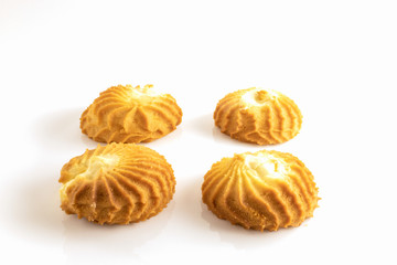 set of butter cookies with cream isolated on white background
