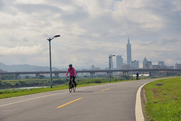 Fototapeta premium People riding bicycles in the morning.