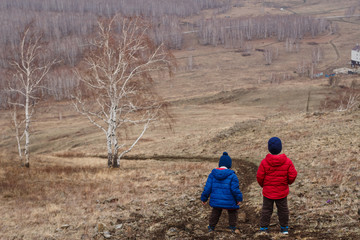 children come down from the mountains