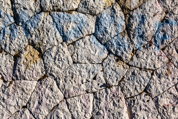 Cobblestones pattern viewed from above as a full frame texture, background.