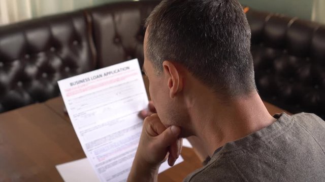 Getting A Business Loan. Credit application form on a paper sheet