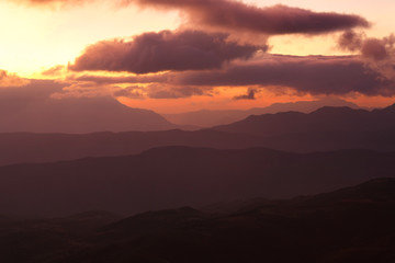 Beautiful landscape of mountain range with sunrise light in dongchuan of China