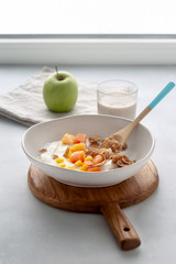 Healthy breakfast flakes greek yogurt fruits