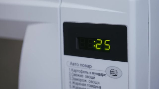 Digital Clock of Microwave Oven Countdown 30 seconds. 4k video.