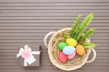 Easter eggs in the basket and gift box