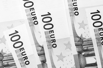 One Hundred euro banknotes as a background close up. Black and white