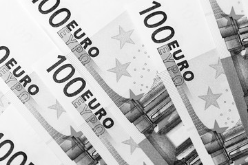 One Hundred euro banknotes as a background close up. Black and white