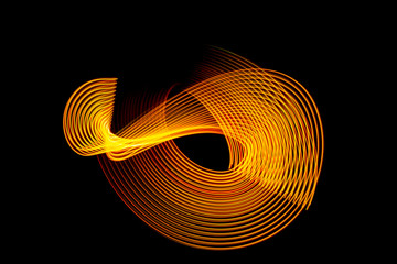 Abstract light orange trails in random motion background image. Striped Neon Lights in Rainbow Colors 
