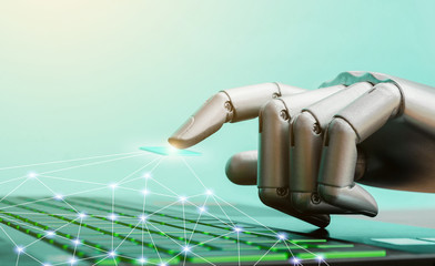 Robot concept or robot hand chatbot pressing computer keyboard enter