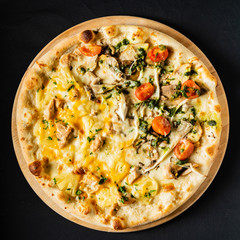 pizza on the black background