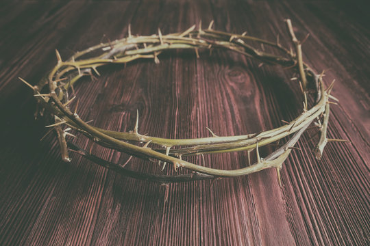Jesus Crown Thorns on Old and Grunge Wood Background.