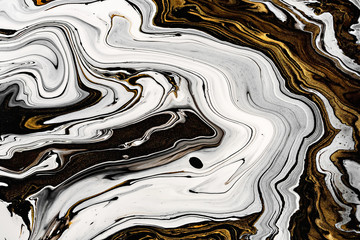 Black, white marble texture with golden lots of bold contrasting veining. Applicable for create...