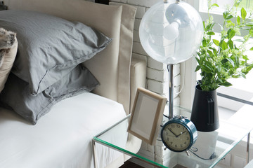 modern table lamp on side table in bedroom.
