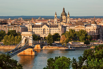 Obraz premium View to Budapest city center across Danube, beautiful cityscape at sunset