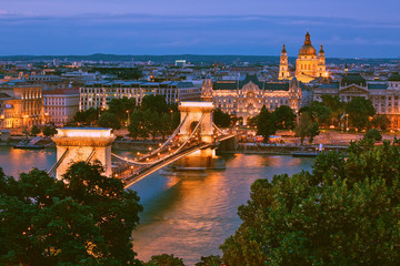 View to Budapest city center across Danube, beautiful cityscape after sunset