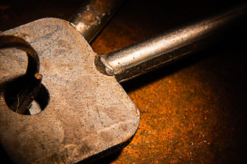 Rusty key in a contrasting light