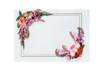 Dried  flowers and leaves on paper background with clipping path