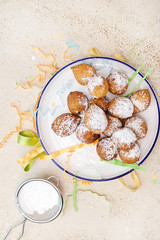 Frittelle - italian fritters in Carnival on white plate .