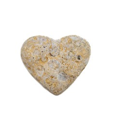 Sea stone in the form of a heart on a white isolated background