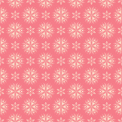Floral seamless pattern. Beige design on pink background