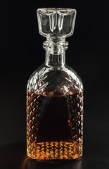 bottle of whiskey, or rum, or alcohol stands