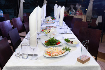 Festive table with bright snacks