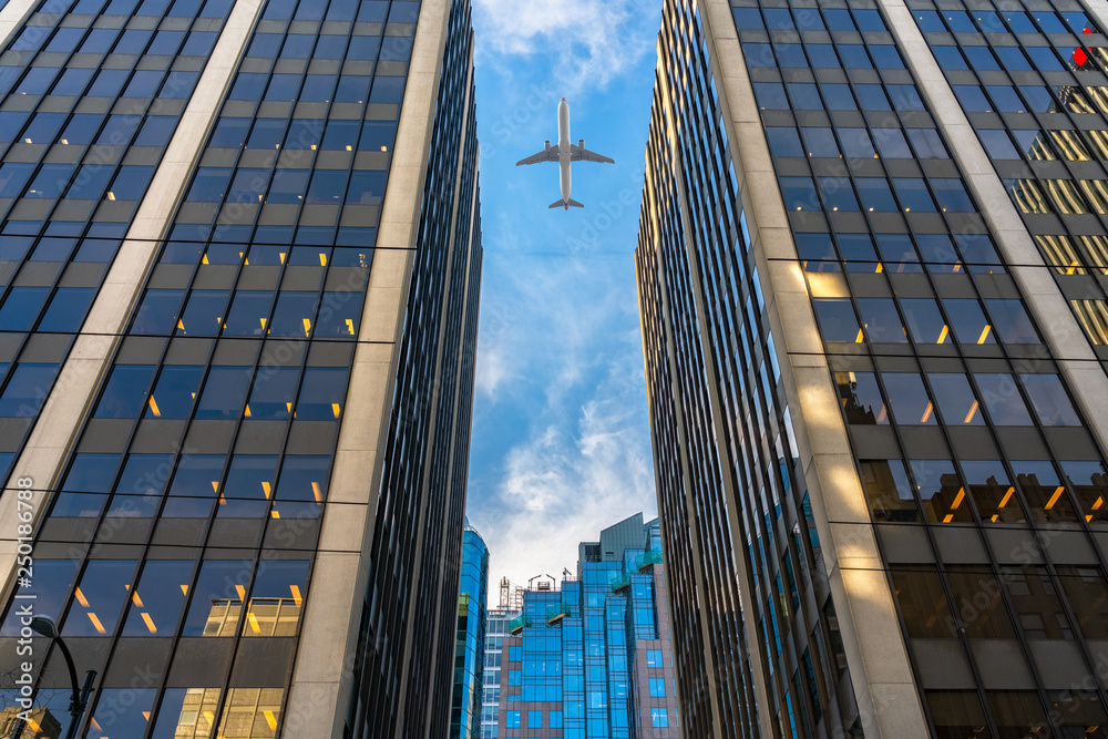 Poster jet plane flying over architecture