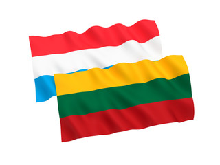 National fabric flags of Luxembourg and Lithuania isolated on white background. 3d rendering illustration. 1 to 2 proportion.